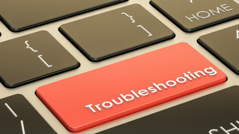Red 'Troubleshooting' key on a keyboard among darker keys, close-up view.